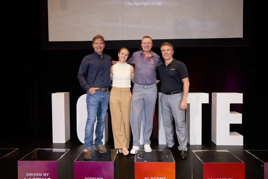 Four presenters posing on the IGNITE stage at ECRS Ignite 2026
