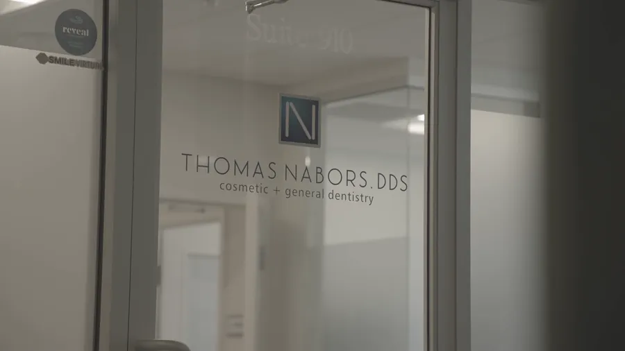 Frosted glass office door for Thomas Nabors, DDS, cosmetic and general dentistry, office promo reel — click to play