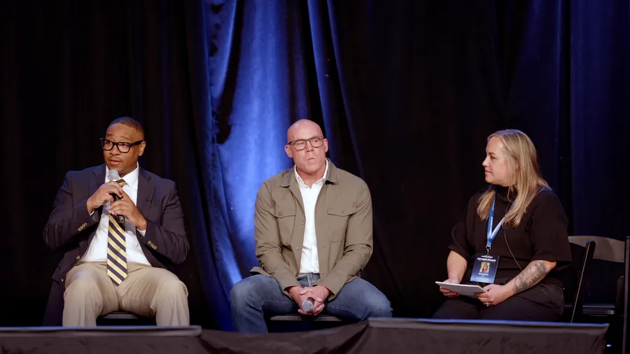 Panel discussion on stage at Nashville AI Week 2026 — click to play